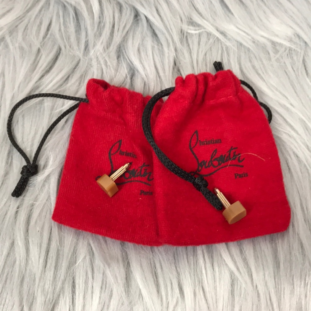 Christian Louboutin Dustbag and heel bottoms